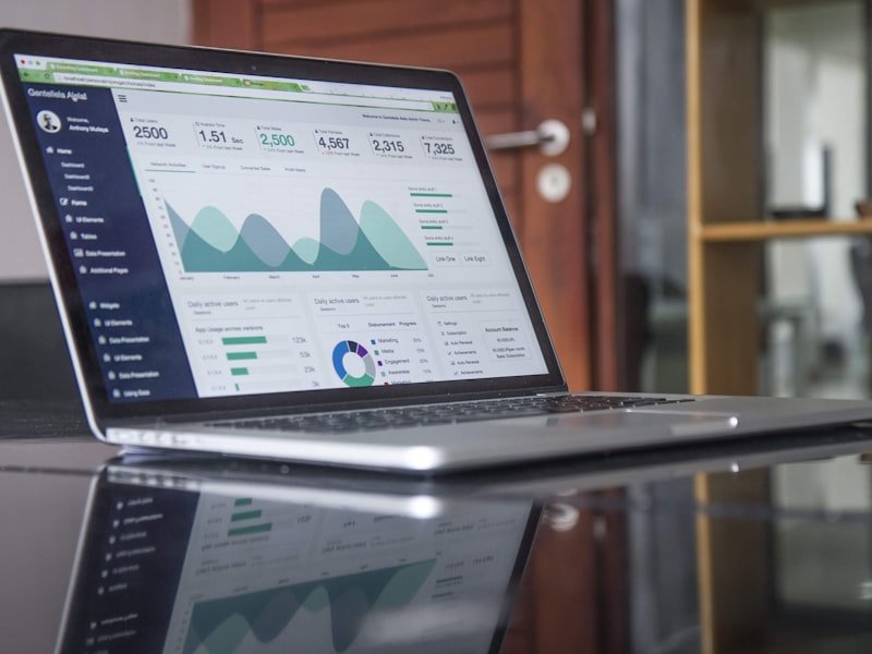 A modern business website shown on desktop and mobile screens